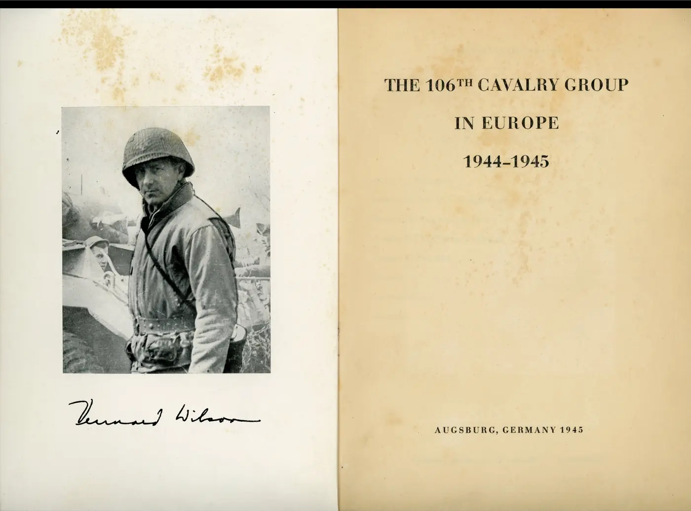 Frontispiece portrait — a cavalry officer in helmet and field jacket standing before an armored car; signed "Vennard Wilson" (Colonel Vennard Wilson, commanding)
