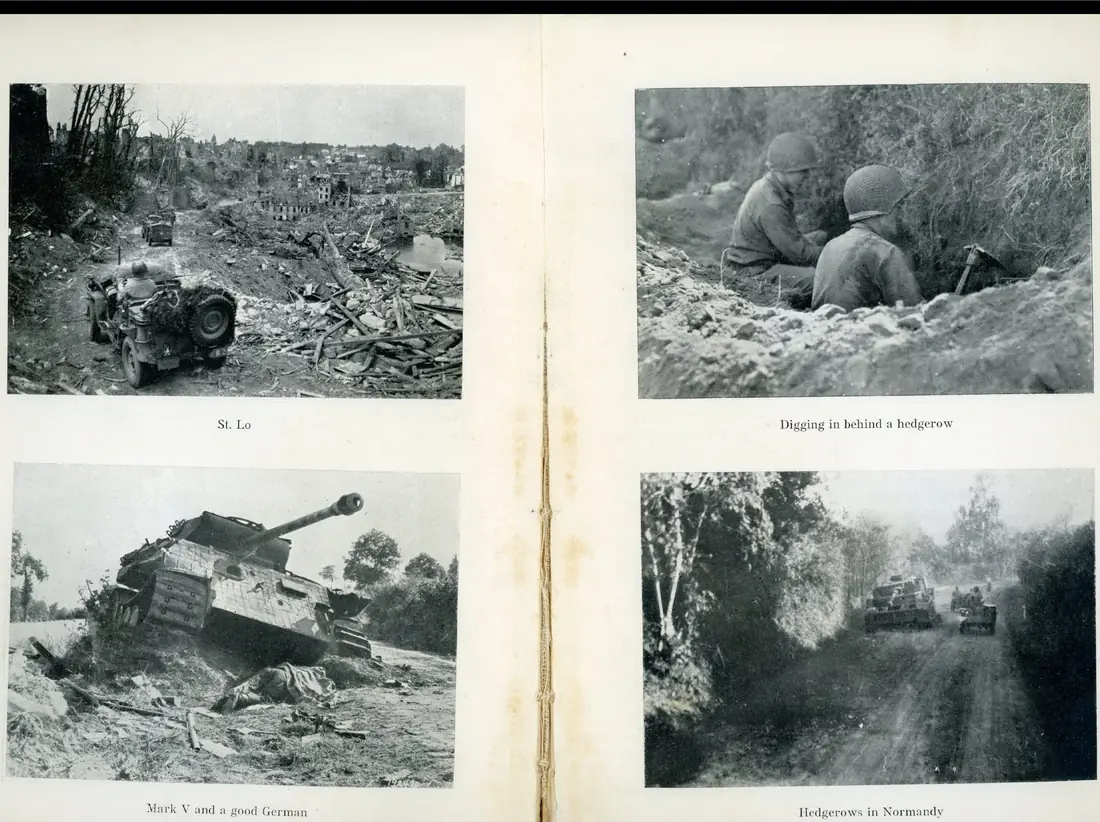 St. Lô — the ruined town, a jeep passing through rubble