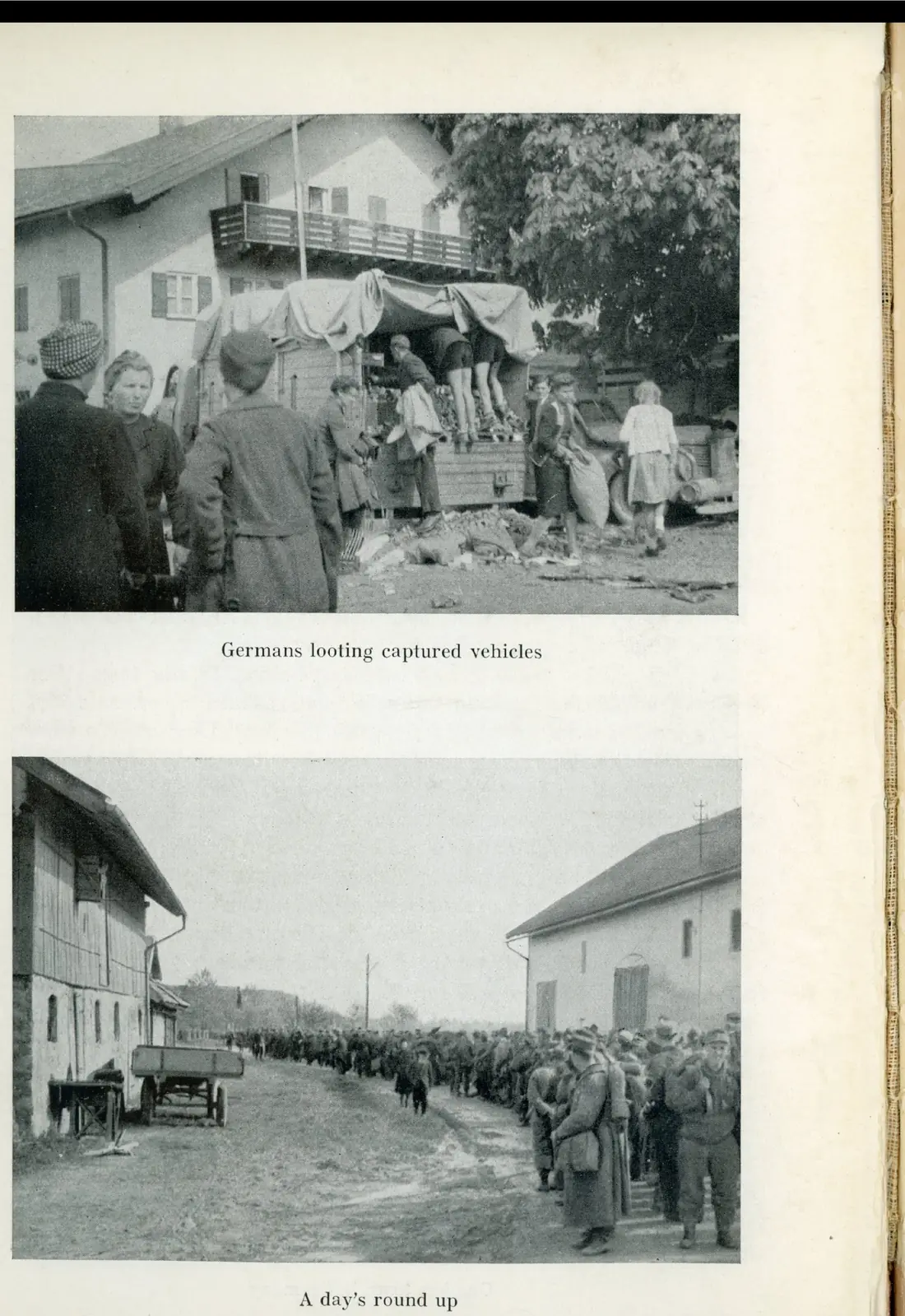Soldiers going through captured German vehicles